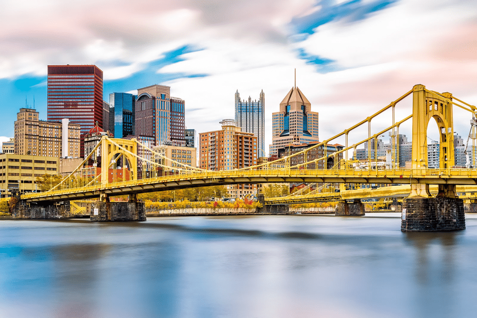 Pittsburgh skyline behind the Pittsburgh bridge